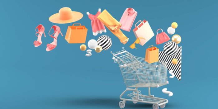 Clothes, bags, high heels, shopping bags and hats floated down to the shopping cart.-3d rendering.